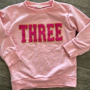 THREE sweatshirt